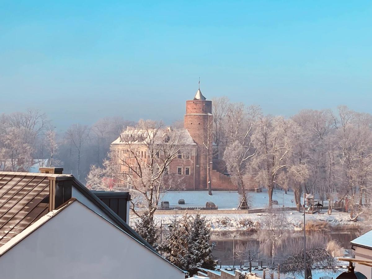 Pokoje Przy Bulwarach Uniejow Esterno foto